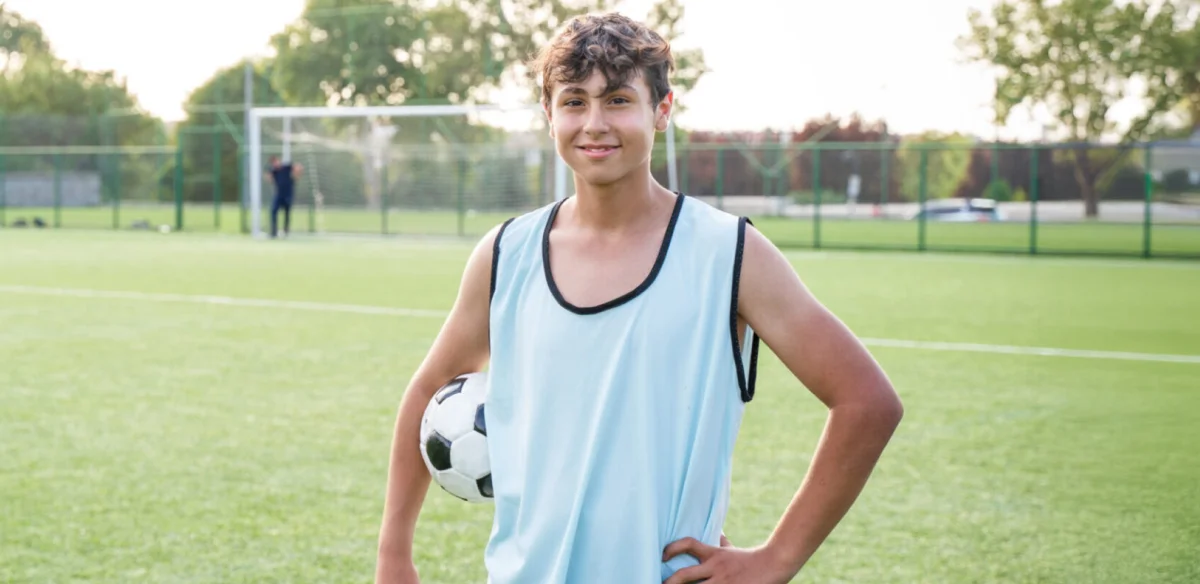 Boy playing soccer